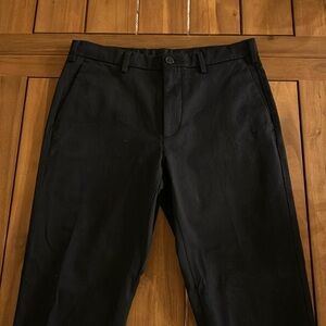 Men’s Uniqlo Slim Chinos in Navy.
